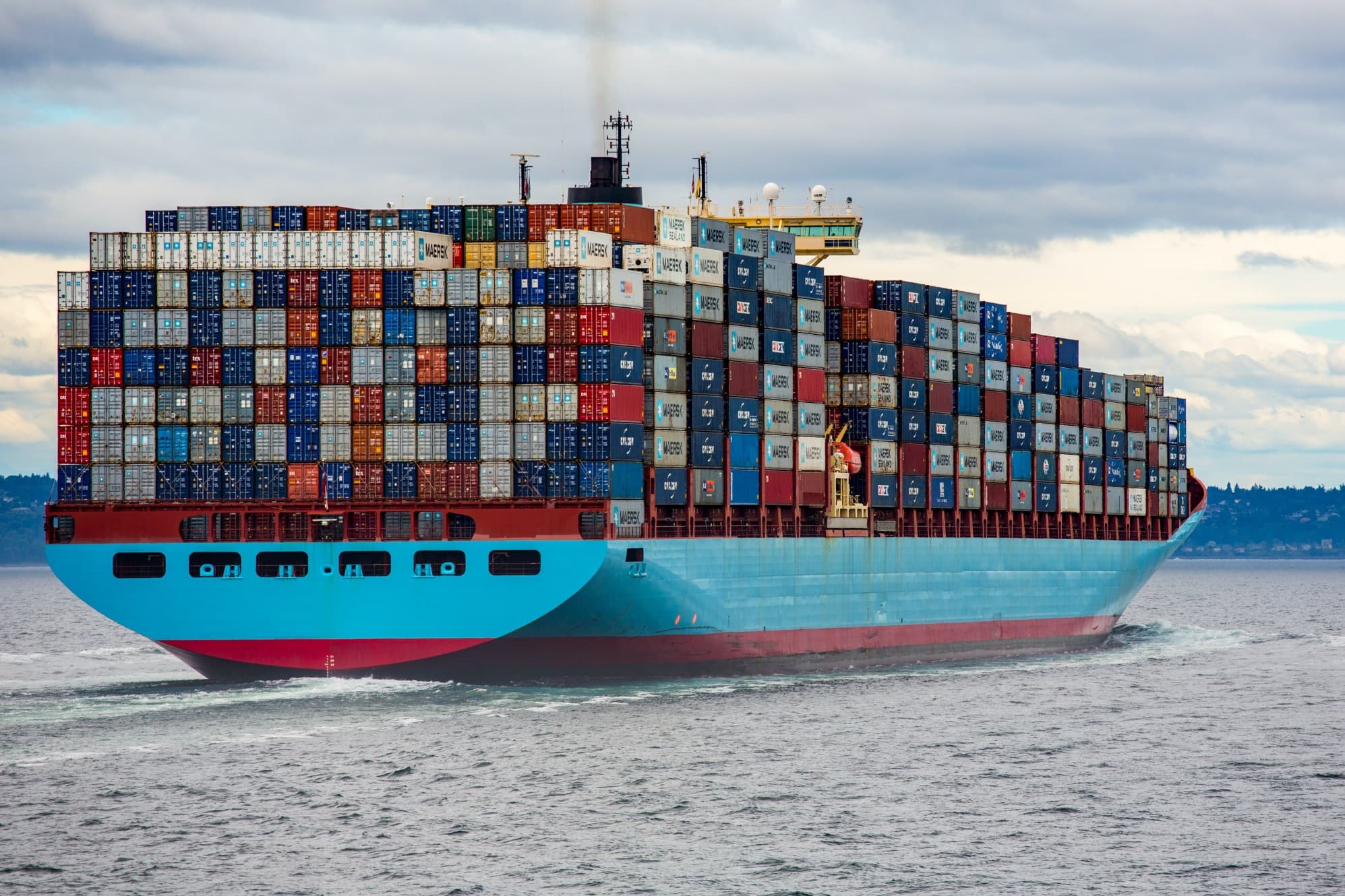 Fully loaded container ship under way in open water